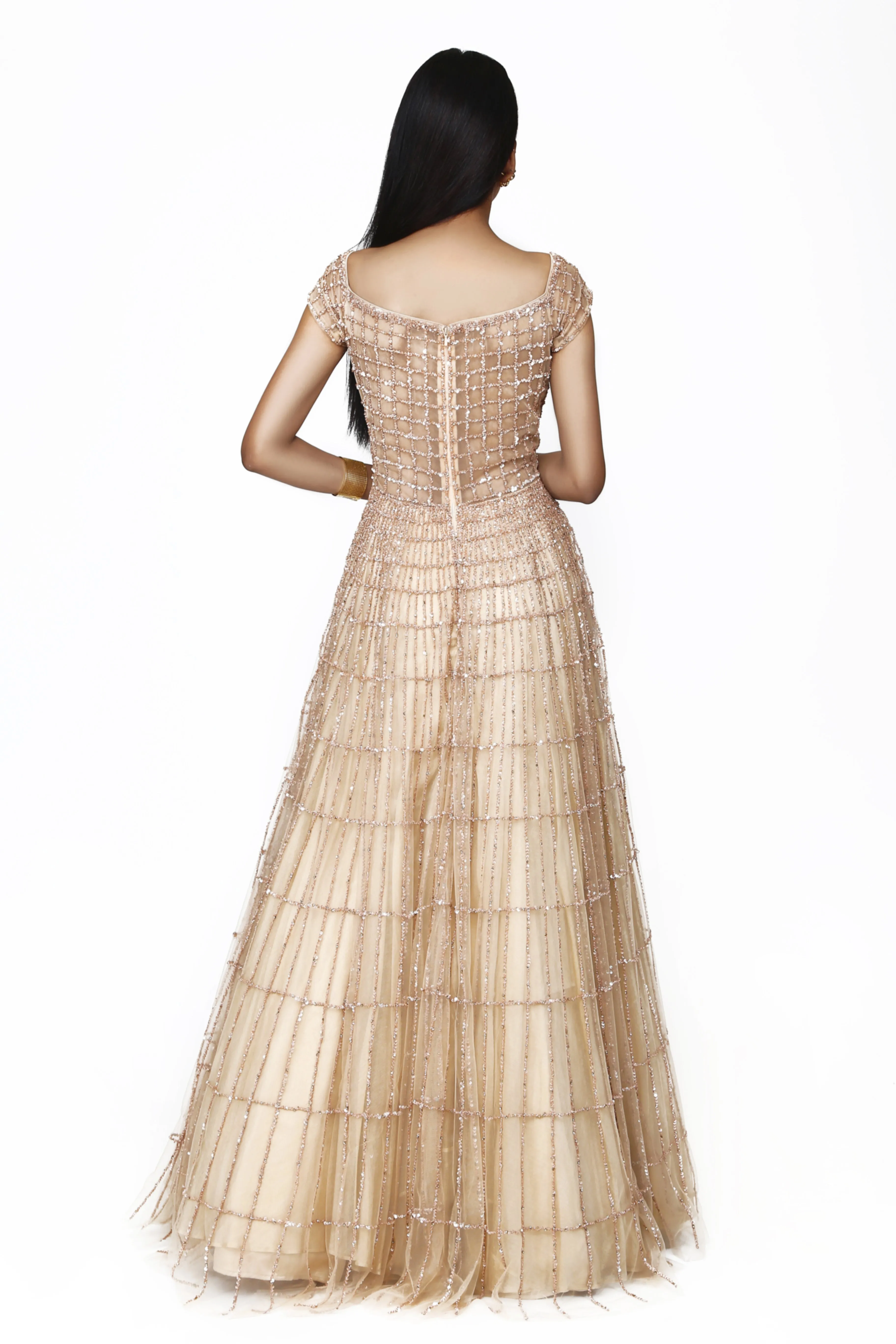 Nude symmetrical box embroidered gown.