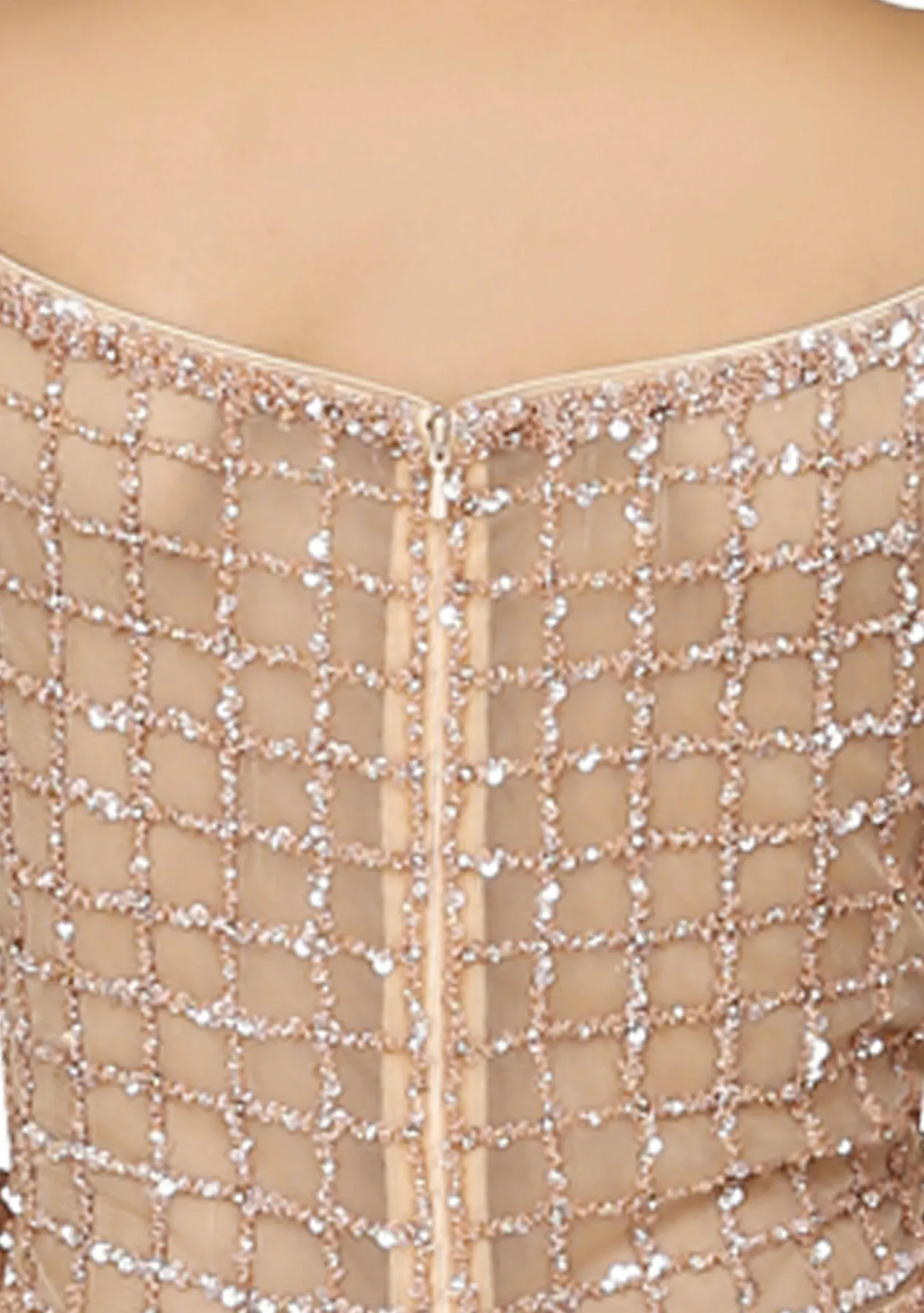 Nude symmetrical box embroidered gown.